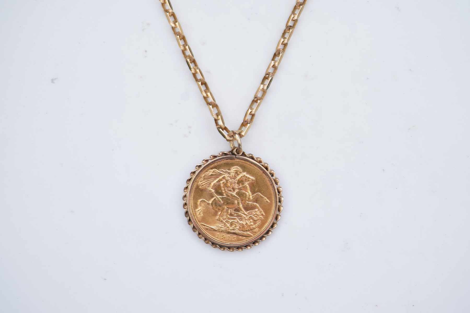 A George V sovereign coin pendant necklace